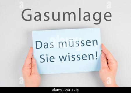 La commission du gaz est en langue allemande sur le papier, nouvelle taxe de règlement en Allemagne, risque d'appauvrissement de la population, crise énergétique Banque D'Images