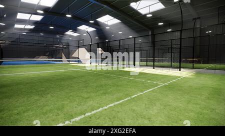 angle d'angle vide padel vert courts de tennis à l'intérieur d'un bâtiment d'entrepôt, situé dans la zone d'installation du complexe sportif. Avec lumières allumées pendant la journée Banque D'Images