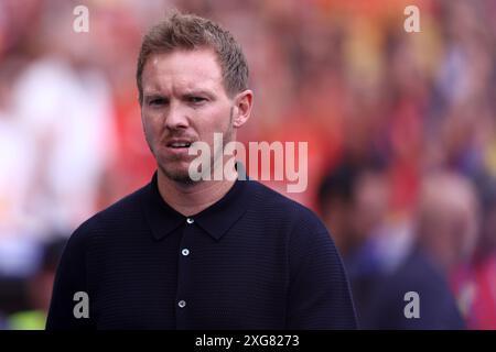 Julian Nagelsmann, entraîneur-chef de l'Allemagne, regarde pendant le match de football en quart de finale de l'Euro 2024 de l'UEFA entre l'Espagne et l'Allemagne. Banque D'Images