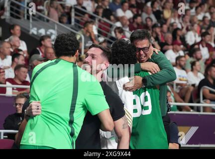 Riga, Lettonie. 7 juillet 2024. Les membres de l'équipe Brésil célèbrent après avoir remporté le match final du tournoi de qualification olympique masculin FIBA 2024 entre la Lettonie et le Brésil à Riga, Lettonie, le 7 juillet 2024. Credit : Edijs Palens/Xinhua/Alamy Live News Banque D'Images