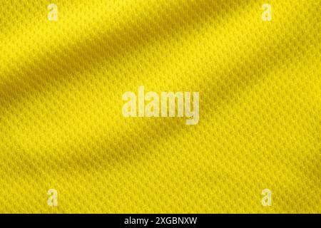 Couleur jaune vêtements en jersey de football texture tissu vêtements de sport fond, gros plan Banque D'Images