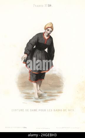 Femme en maillot de bain pour les bains de mer. En bonnet de bain, top en coton noir et pantalons avec passepoil rouge, pagayer dans l'océan. Costume de dame pour les bains de mer. Gravure sur acier colorée à la main par Geoffroy du Musée Cosmopolite, Musée de costumes, Musée Cosmopolitan, éditée par ancienne maison Aubert, Paris, 1850. Banque D'Images