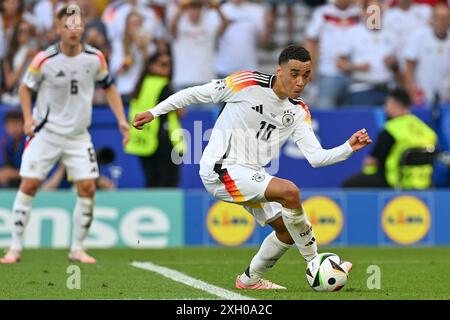 Jamal Musiala (10 ans), de l'Allemagne, photographié lors d'un match de football entre les équipes nationales d'Espagne et d'Allemagne dans la phase quart de finale du tournoi UEFA Euro 2024 , le jeudi 5 juillet 2024 à Stuttgart , Allemagne . PHOTO SPORTPIX | David Catry Banque D'Images