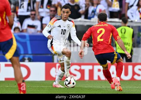 Jamal Musiala (10 ans), de l'Allemagne, photographié lors d'un match de football entre les équipes nationales d'Espagne et d'Allemagne dans la phase quart de finale du tournoi UEFA Euro 2024 , le jeudi 5 juillet 2024 à Stuttgart , Allemagne . PHOTO SPORTPIX | David Catry Banque D'Images