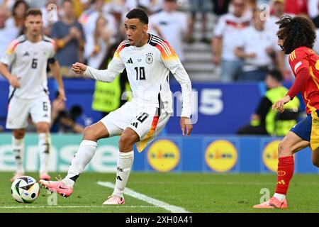 Jamal Musiala (10 ans), de l'Allemagne, photographié lors d'un match de football entre les équipes nationales d'Espagne et d'Allemagne dans la phase quart de finale du tournoi UEFA Euro 2024 , le jeudi 5 juillet 2024 à Stuttgart , Allemagne . PHOTO SPORTPIX | David Catry Banque D'Images