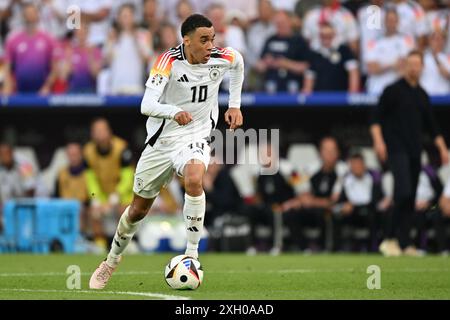 Jamal Musiala (10 ans), de l'Allemagne, photographié lors d'un match de football entre les équipes nationales d'Espagne et d'Allemagne dans la phase quart de finale du tournoi UEFA Euro 2024 , le jeudi 5 juillet 2024 à Stuttgart , Allemagne . PHOTO SPORTPIX | David Catry Banque D'Images