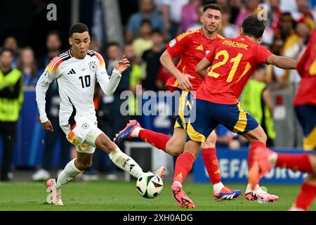 Jamal Musiala (10 ans), de l'Allemagne, photographié lors d'un match de football entre les équipes nationales d'Espagne et d'Allemagne dans la phase quart de finale du tournoi UEFA Euro 2024 , le jeudi 5 juillet 2024 à Stuttgart , Allemagne . PHOTO SPORTPIX | David Catry Banque D'Images