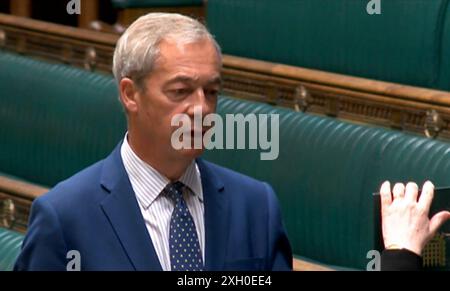 Nigel Farage, leader réformiste britannique, prête serment d'allégeance au roi Charles III, à la Chambre des communes, Westminster, Londres. Londres. Date de la photo : jeudi 11 juillet 2024. Banque D'Images