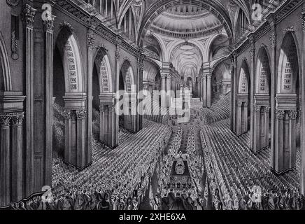Lithographie représentant les funérailles du duc de Wellington à l'intérieur de la cathédrale Paul de Londres, Angleterre, le 20 novembre 1852. L'image montre le vaste espace de la cathédrale, rempli de rangées de deuils. Le cercueil du duc est positionné au centre de l'image, entouré de dignitaires et de militaires. Banque D'Images