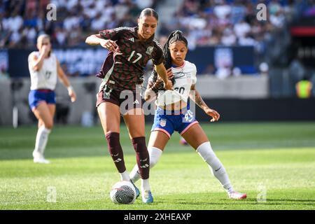 Harrison, États-Unis. 13 juillet 2024. Harrison, États-Unis, 13 juillet 2024 : Myra Delgadillo (17 Mexique) et Croix Bethune (20 États-Unis) lors de l'amical international entre les États-Unis et le Mexique au Red Bull Arena à Harrison, NJ, États-Unis (USAGE ÉDITORIAL SEULEMENT). (Rebekah Wynkoop/SPP) crédit : SPP Sport Press photo. /Alamy Live News Banque D'Images