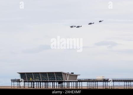 Formation de Taranto au-dessus de Southport Pier comprenant Westland Wasp, Royal Navy Swordfish et une paire d'hélicoptères Wildcat HMA2 photographiés le 13 juillet 2024 Banque D'Images