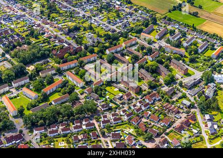 Luftbild, Reihenhaus-Mietshäuser Wohnsiedlung Kurt-Schumacher-Straße, Theodor-Heuss-Straße und Herringer Heide, Stadtbezirk Herringen, Hamm, Ruhrgebiet, Rhénanie-du-Nord-Westphalie, Deutschland ACHTUNGxMINDESTHONORARx60xEURO *** vue aérienne, maison mitoyenne immeubles résidentiels Kurt Schumacher Straße, Theodor Heuss Straße et Herringer Heide, quartier Herringen, Hamm, Ruhr area, Rhénanie-du-Nord-Westphalie, Allemagne ACHTUNGxMINDESTHONORARx60xEURO Banque D'Images