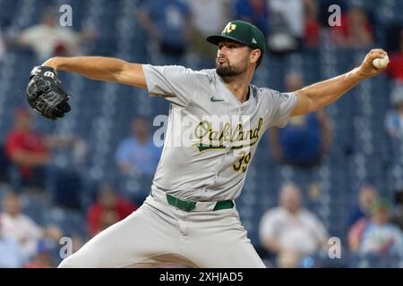 Philadelphie, États-Unis. 14 juillet 2024. Le lanceur de clôture d'Oakland Athletics Kyle Muller lance lors de la neuvième manche d'un match de baseball de la MLB contre les Phillies de Philadelphie, le dimanche 14 juillet 2024, à Philadelphie. Photo de Laurence Kesterson/UPI crédit : UPI/Alamy Live News Banque D'Images