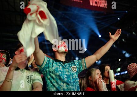 Manchester, Royaume-Uni. 14 juillet 2024. Un fan de l'Angleterre réagit alors que l'Angleterre perd dans la finale de l'UEFA EURO 2024 entre l'Angleterre et l'Espagne à AO Arena, les fans de l'Angleterre affrontent la défaite lorsque l'Angleterre perd 1:2 contre l'Espagne. Crédit : SOPA images Limited/Alamy Live News Banque D'Images