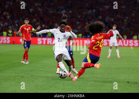 Berlin, Allemagne, 14 juillet 2024. Kobbie Mainoo et Marc Cucurella lors du match entre l'Espagne et l'Angleterre. UEFA Euro 2024 Allemagne. Correspondance finale. Banque D'Images