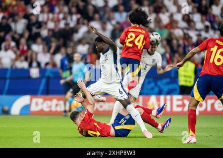 Berlin, Allemagne. 14 juillet 2024. Marc Guehi (6 ans) d'Angleterre et Aymeric Laporte (14 ans) d'Espagne vus lors de la finale de l'Euro 2024 de l'UEFA entre l'Espagne et l'Angleterre à l'Olympiastadion de Berlin. Crédit : Gonzales photo/Alamy Live News Banque D'Images