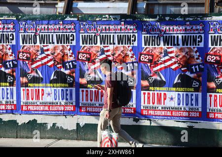 New York, États-Unis. 15 juillet 2024. Joe Biden VS Donald Trump panneau d'affichage dans la rue près de Polymarket, le plus grand marché de prédiction au monde dans la petite Italie à New York le 15 juillet 2024. Photo de Charles Guerin/ABACAPRESS. COM Credit : Abaca Press/Alamy Live News Banque D'Images