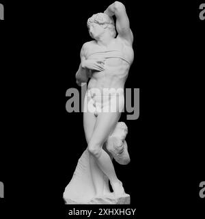 L'esclave mourant est une statue en marbre de Michel-Ange Buonarroti, créée entre 1513 et 1516. Il représente une figure masculine couchée avec une anatomie détaillée et une posture expressive, illustrant la sculpture de la Renaissance. Banque D'Images