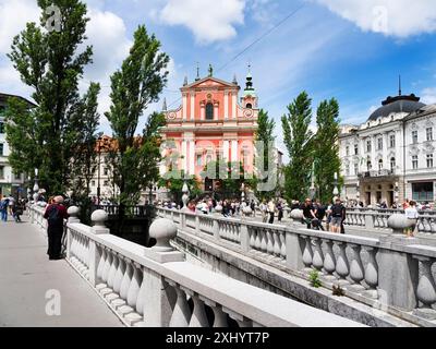 Le Triple Pont sur la rivière Ljubljanica menant à la place Preseren à Ljubljana Slovénie Banque D'Images