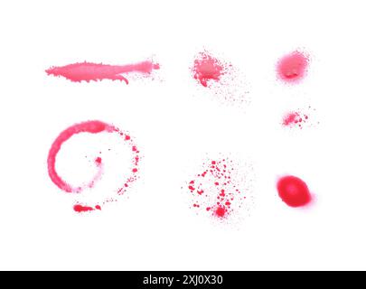 Taches abstraites faites avec de la peinture rouge en aérosol isolé sur blanc, vue de dessus Banque D'Images