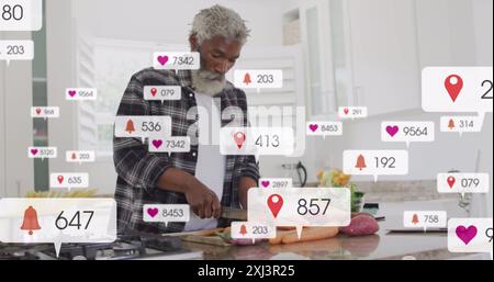 Image de plusieurs barres de notification, homme afro-américain senior coupant des légumes dans la cuisine. Composite numérique, affaires, croissance, alimentation, medi social Banque D'Images