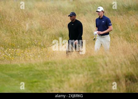 Les américains Tiger Woods et Maverick McNealy le 17, lors d'une journée d'essais avant l'Open à Royal Troon, South Ayrshire, Écosse. Date de la photo : mercredi 17 juillet 2024. Banque D'Images