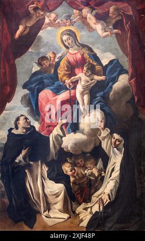 PÉROUSE, ITALIE - 15 MAI 2024 : la peinture de Madone avec les réunis Dominique et Catherine de Sienne dans Basilica di San Domenico par Giovanni Lanfranco Banque D'Images