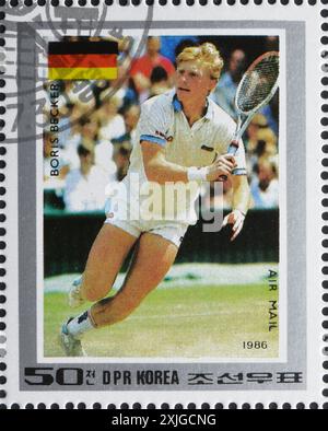 Timbre-poste oblitéré imprimé par la Corée du Nord, qui montre Boris Becker, champions de tennis, vers 1986. Banque D'Images