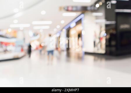 Abstrait flou les gens dans l'intérieur moderne du centre commercial arrière-plan défoqué Banque D'Images