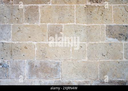 Fond d'un mur fait de grosses vieilles pierres naturelles Banque D'Images