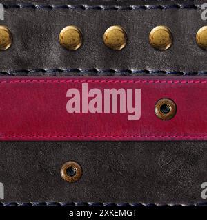 Photo sans couture 4k texture photo de matériau en cuir de couleur noire avec rivets en laiton et ceintures cousues colorées. Banque D'Images