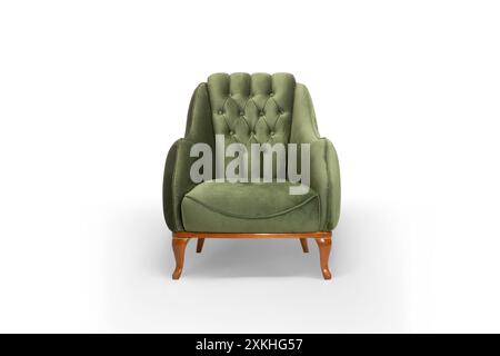 Fauteuil en velours vert élégant et moelleux avec pieds en bois Banque D'Images