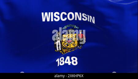 Gros plan du drapeau de l'État du Wisconsin ondulant dans le vent. Drapeau bleu avec un blason central. rendu d'illustration 3d. Tissu ondulé. Backgroun texturé Banque D'Images