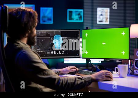 IA sensible sur écran vert interagissant avec l'ingénieur en informatique, l'accueillant après avoir modifié son propre code source. Intelligence artificielle consciente sur PC maquette devenant vivante Banque D'Images