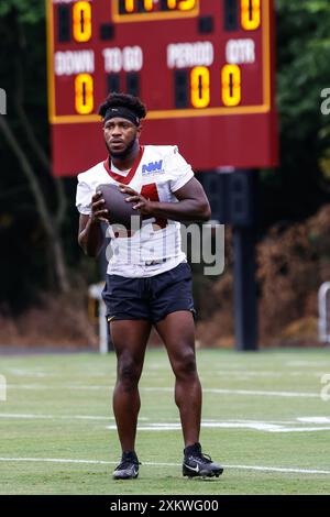 Davion Davis (84), receveur des commandants de Washington, s’échauffant avant le premier jour de la pratique avant le début de la saison au centre d’entraînement OrthoVirginia au Commanders Park à Ashburn, Virginie, le 24 juillet 2024 (Alyssa Howell/ image of Sport) Banque D'Images