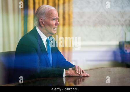 Washington, DC, États-Unis. 24 juillet 2024. Le président AMÉRICAIN Joe Biden prononce un discours à l'occasion d'un discours prononcé à l'échelle nationale par le Bureau ovale de la Maison Blanche à Washington, DC, États-Unis, le 24 juillet 2024. Le président Bidens s'adresse à la nation pour la première fois depuis la fin de sa campagne de réélection et l'approbation du vice-président Kamala Harris. Crédit : Shawn Thew/Pool via CNP/dpa/Alamy Live News Banque D'Images