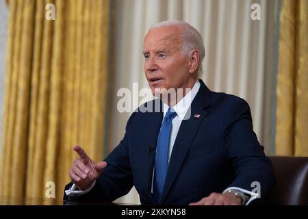 Washington, États-Unis. 24 juillet 2024. Le président Joe Biden s'adresse à la nation depuis le bureau ovale de la Maison Blanche à Washington, DC, USA, mercredi 24 juillet, 2024, au sujet de sa décision de rejeter sa candidature à la réélection démocrate. Photo de Evan Vucci/Pool/ABACAPRESS. COM Credit : Abaca Press/Alamy Live News Banque D'Images