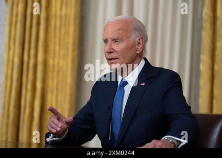 Washington, États-Unis. 24 juillet 2024. Le président Joe Biden s’adresse à la nation depuis le Bureau ovale de la Maison Blanche à Washington, mercredi 24 juillet 2024, au sujet de sa décision de renoncer à sa candidature à la réélection démocrate. (Photo par Evan Vucci/Pool/Sipa USA) crédit : Sipa USA/Alamy Live News Banque D'Images