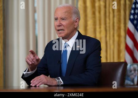 Washington, États-Unis. 24 juillet 2024. Le président Joe Biden s’adresse à la nation depuis le Bureau ovale de la Maison Blanche à Washington, mercredi 24 juillet 2024, au sujet de sa décision de renoncer à sa candidature à la réélection démocrate. (Photo par Evan Vucci/Pool/Sipa USA) crédit : Sipa USA/Alamy Live News Banque D'Images