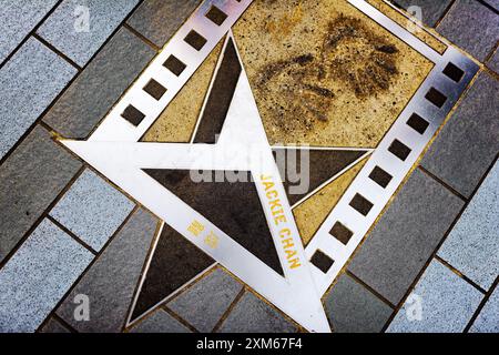 Le nom de Jackie Chan sur l'étoile métallique de l'Avenue des Stars Banque D'Images