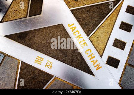 Le nom de Jackie Chan sur l'étoile métallique de l'Avenue des Stars Banque D'Images