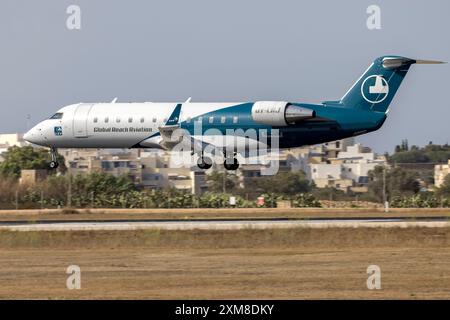 Global Reach Aviation (Copenhagen Air Taxi) Bombardier CRJ-200LR (CL-600-2B19) (REG : OY-CRJ) piste d'atterrissage 31. Banque D'Images