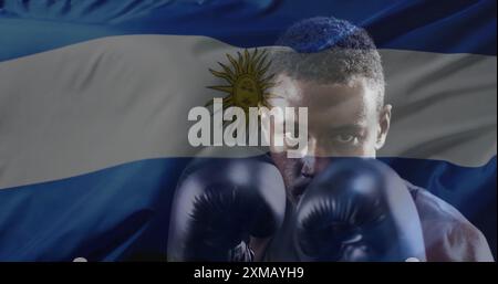 Image du drapeau de l'argentine au-dessus du boxeur masculin afro-américain Banque D'Images