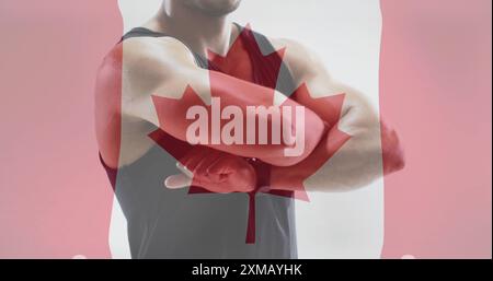 Image du drapeau du canada sur homme fort masculin biracial Banque D'Images