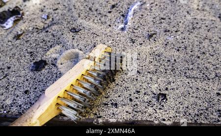 Détail de l'outil pour gratter et nettoyer la saleté sur le métal Banque D'Images