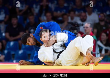 Margelidon Arthur (Kanada, Weiß) vs KHOJAZODA Behruzi (TadschiUzbekistan, blau), FRA, Olympische Spiele Paris 2024, Judo, Herren bis 73 kg, Preliminary Round, 29.07.2024 Foto : Eibner-Pressefoto/Michael Memmler Banque D'Images