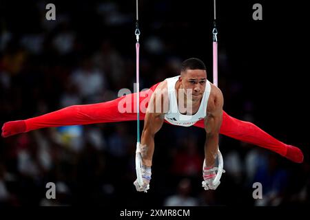 Le Britannique Joe Fraser se produit sur les anneaux lors de la finale par équipe masculine à Bercy Arena, le troisième jour des Jeux Olympiques de Paris 2024 en France. Date de la photo : lundi 29 juillet 2024. Banque D'Images