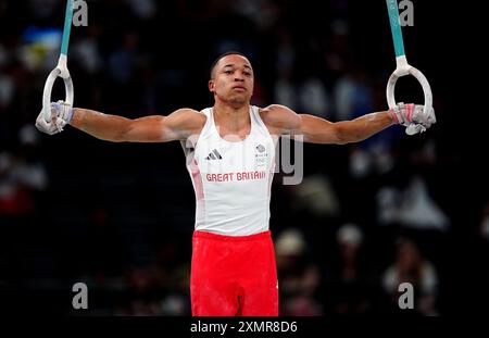 Le Britannique Joe Fraser se produit sur les anneaux lors de la finale par équipe masculine à Bercy Arena, le troisième jour des Jeux Olympiques de Paris 2024 en France. Date de la photo : lundi 29 juillet 2024. Banque D'Images
