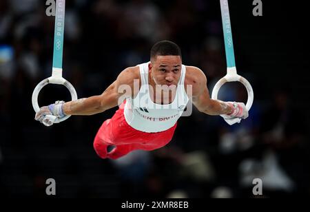 Le Britannique Joe Fraser se produit sur les anneaux lors de la finale par équipe masculine à Bercy Arena, le troisième jour des Jeux Olympiques de Paris 2024 en France. Date de la photo : lundi 29 juillet 2024. Banque D'Images