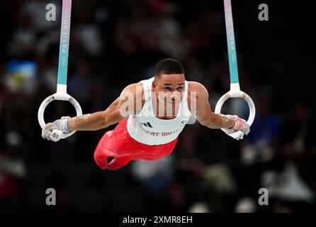 Le Britannique Joe Fraser se produit sur les anneaux lors de la finale par équipe masculine à Bercy Arena, le troisième jour des Jeux Olympiques de Paris 2024 en France. Date de la photo : lundi 29 juillet 2024. Banque D'Images